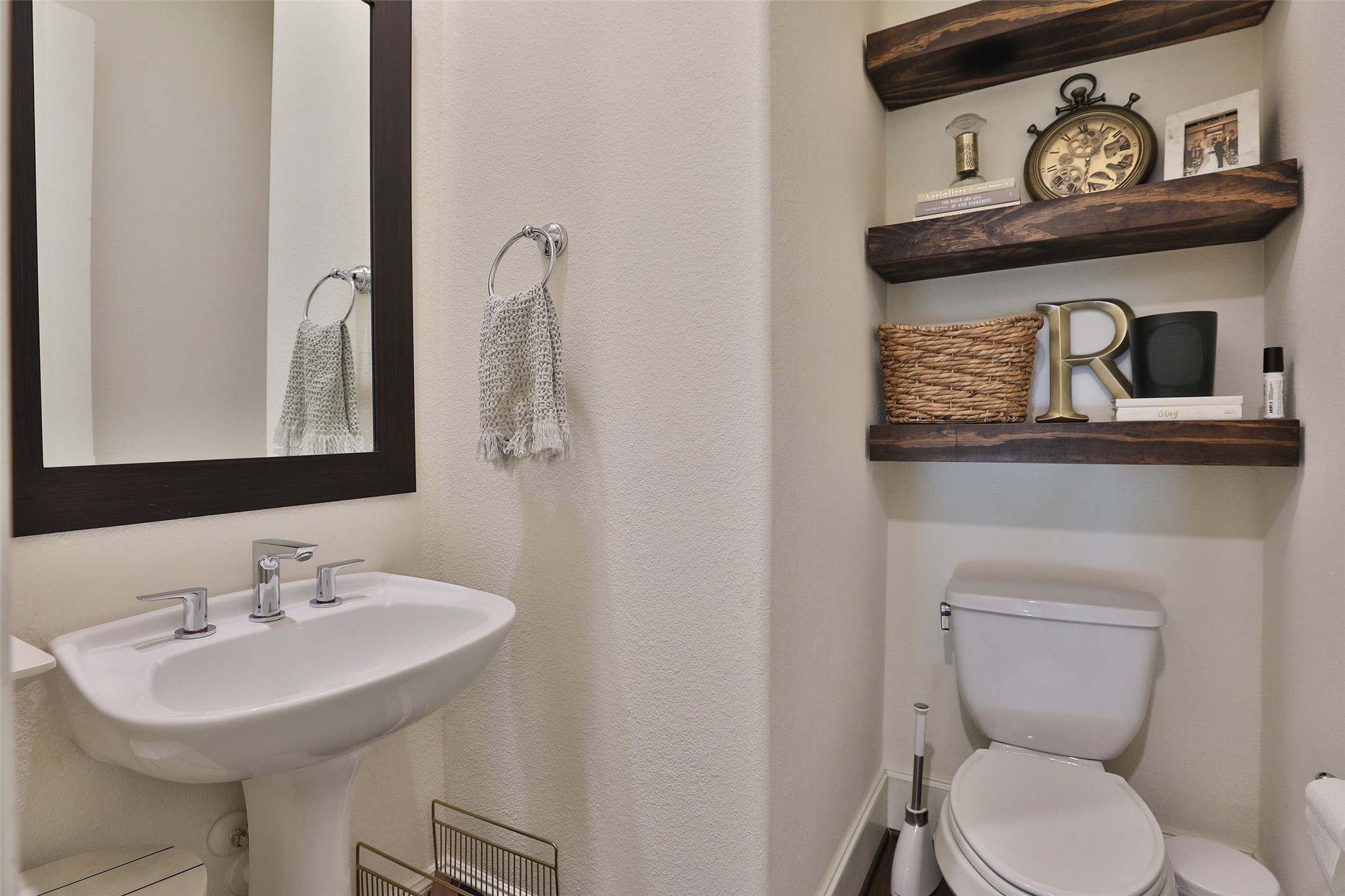 2303 Kolbe Run Lane Houston, TX 77080 - Photo 22 of 35 The powder bath is situated in the stairwell on the second floor