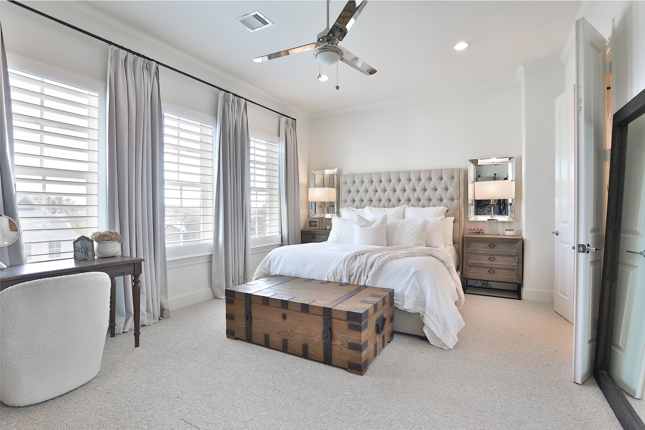 2303 Kolbe Run Lane Houston, TX 77080 - Photo 23 of 35 The primary ensuite is ready for moody evenings and light filled mornings. 10' ceilings and recessed LED lights shine brightly while you start the day.