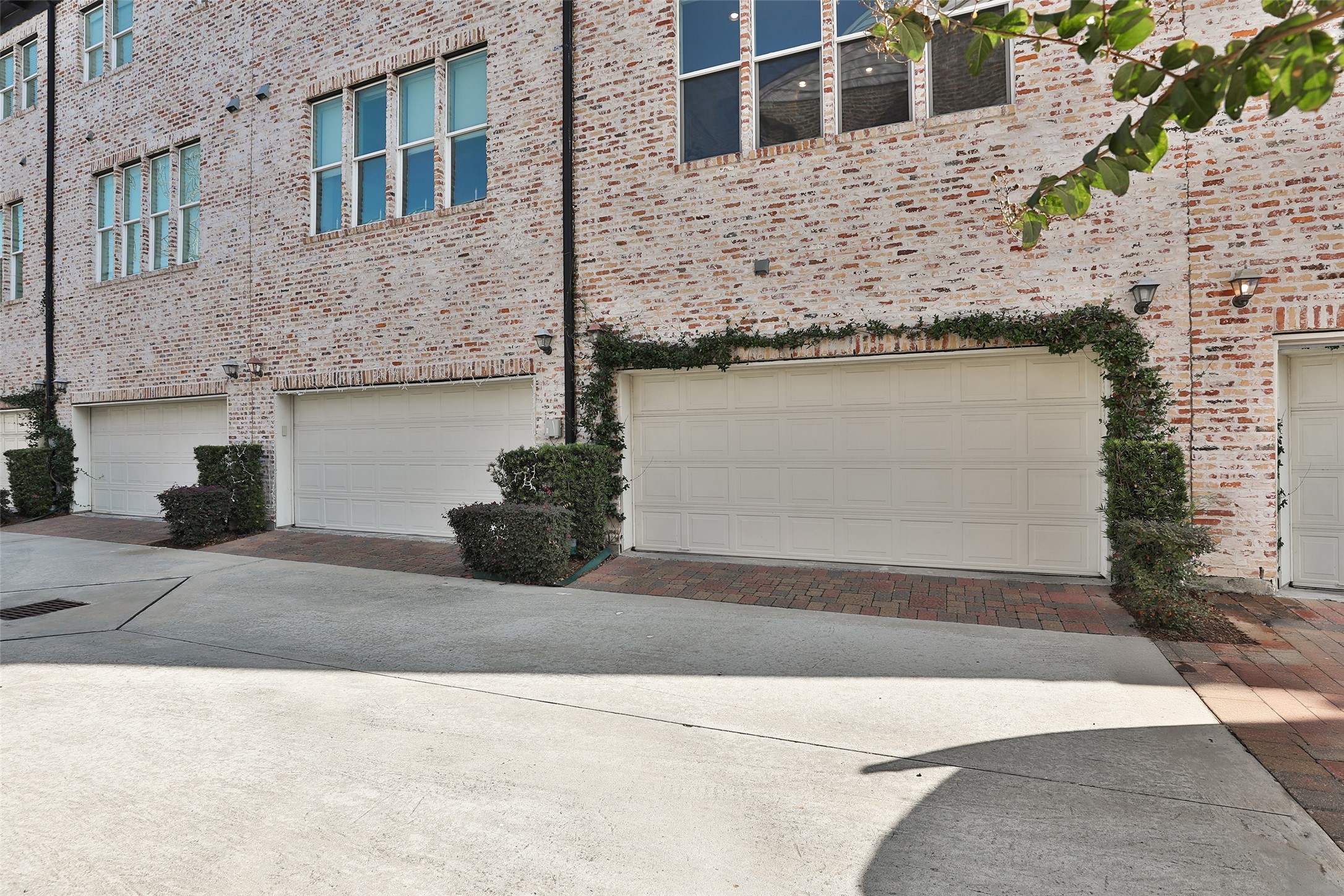 2303 Kolbe Run Lane Houston, TX 77080 - Photo 32 of 35 Private garage entrance is lined with ivy giving "summer in Connecticut" vibes.