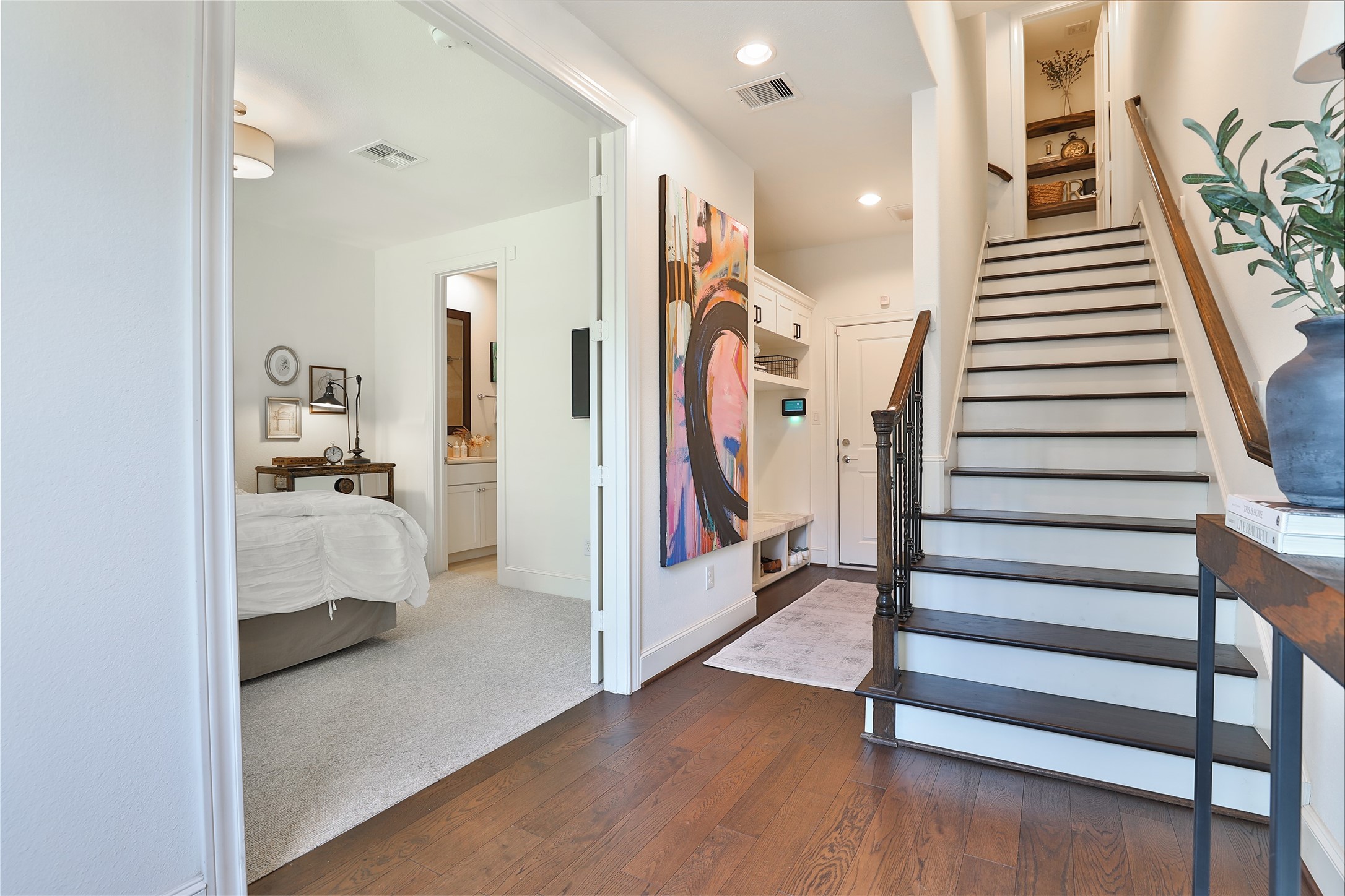2303 Kolbe Run Lane Houston, TX 77080 - Photo 6 of 35 A custom mud bench with sleek storage cabinetry offers both functionality and flair from the garage entry.