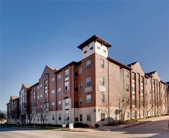 a front view of a building with large windows