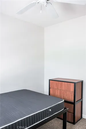 a view of a room with a table and a window