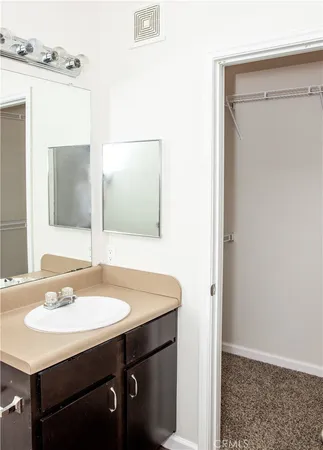 a bathroom with a toilet and a bathtub