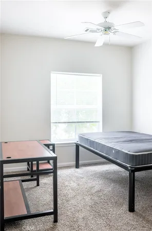 a living room with a table and window