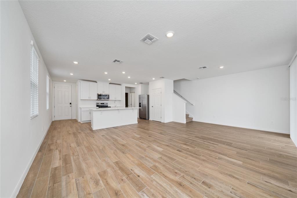 4272 Ranch House Road St. Cloud, FL 34772 - Photo 11 of 29 a view of kitchen with kitchen island sink and refrigerator
