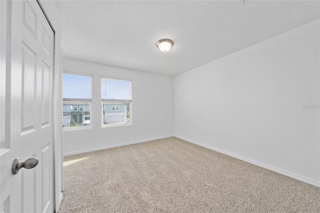 4272 Ranch House Road St. Cloud, FL 34772 - Photo 17 of 29 a view of an empty room with a window