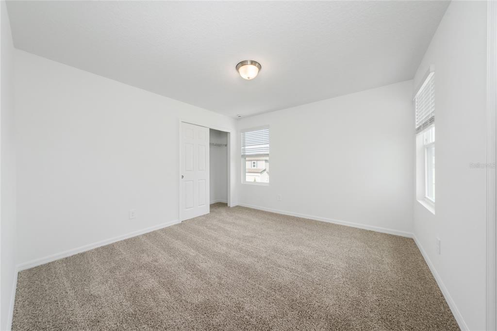 4272 Ranch House Road St. Cloud, FL 34772 - Photo 20 of 29 a view of an empty room with a window