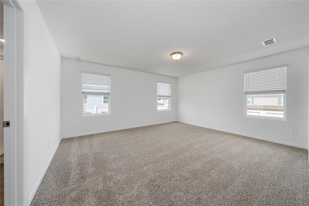 4272 Ranch House Road St. Cloud, FL 34772 - Photo 23 of 29 a view of an empty room with a window