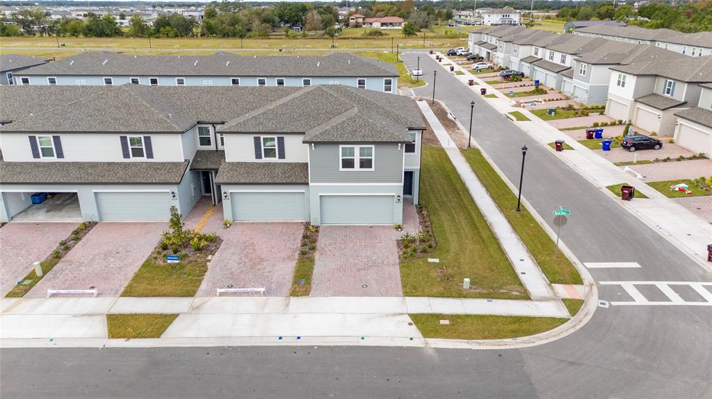 4272 Ranch House Road St. Cloud, FL 34772 - Photo 3 of 29 a aerial view of a house with swimming pool