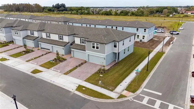 swimming pool view with a lake view