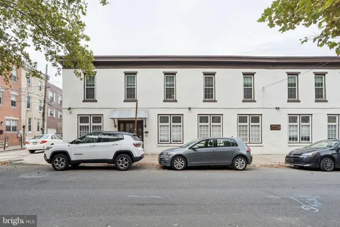 a car parked in front of a building