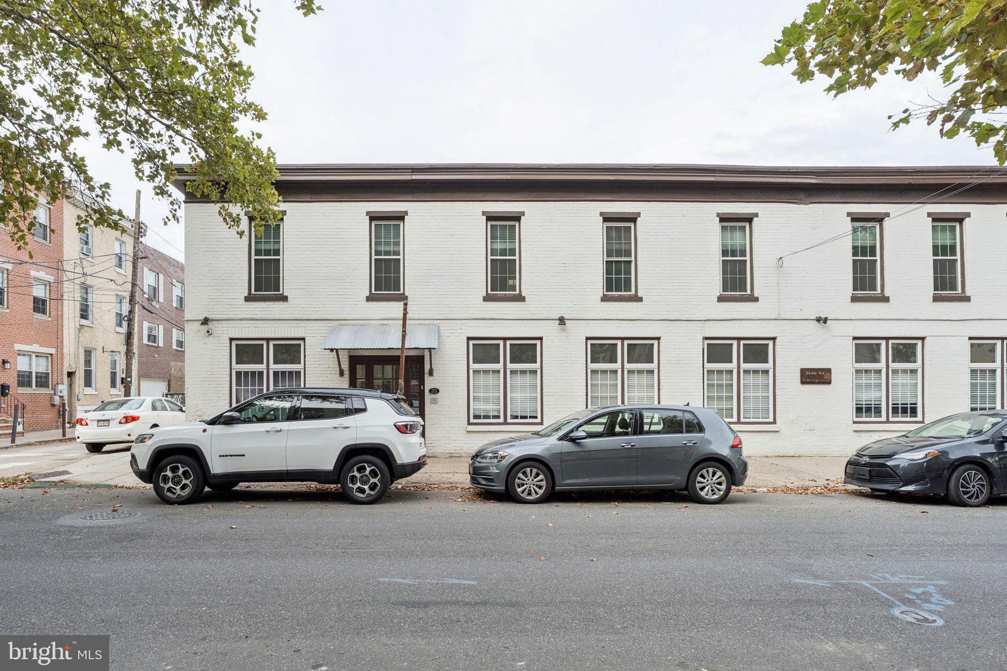 1246 East Montgomery Avenue, Unit 5 Philadelphia, PA 19125 - Photo 17 of 18 a car parked in front of a building