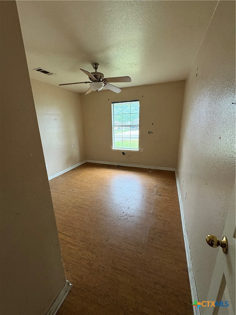 206 Timber Ridge Drive Nolanville, TX 76559 - Photo 17 of 21 an empty room with a empty space and windows
