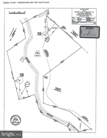 a picture of a room with a white wall and a bench