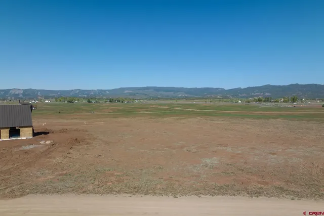 a view of a lake and a mountain