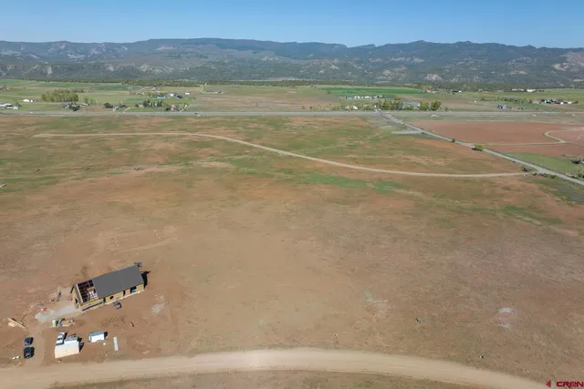 a view of a lake with a mountain
