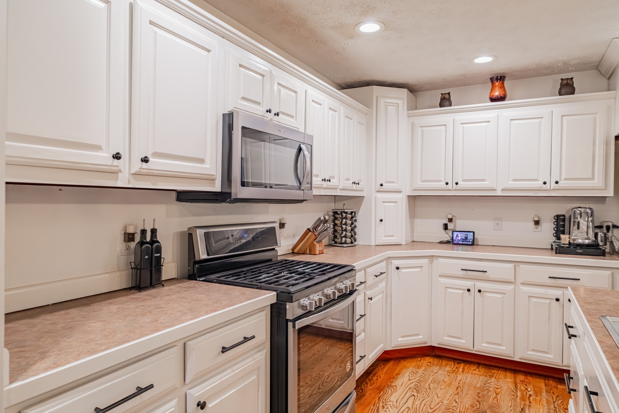 1450 Pleasant Hill Road McMinnville, TN 37110 - Photo 15 of 68 a kitchen with granite countertop white cabinets and white appliances