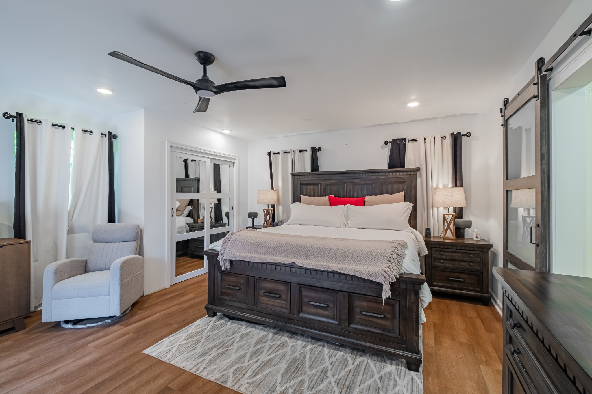 1450 Pleasant Hill Road McMinnville, TN 37110 - Photo 17 of 68 a spacious bedroom with a bed and a couch