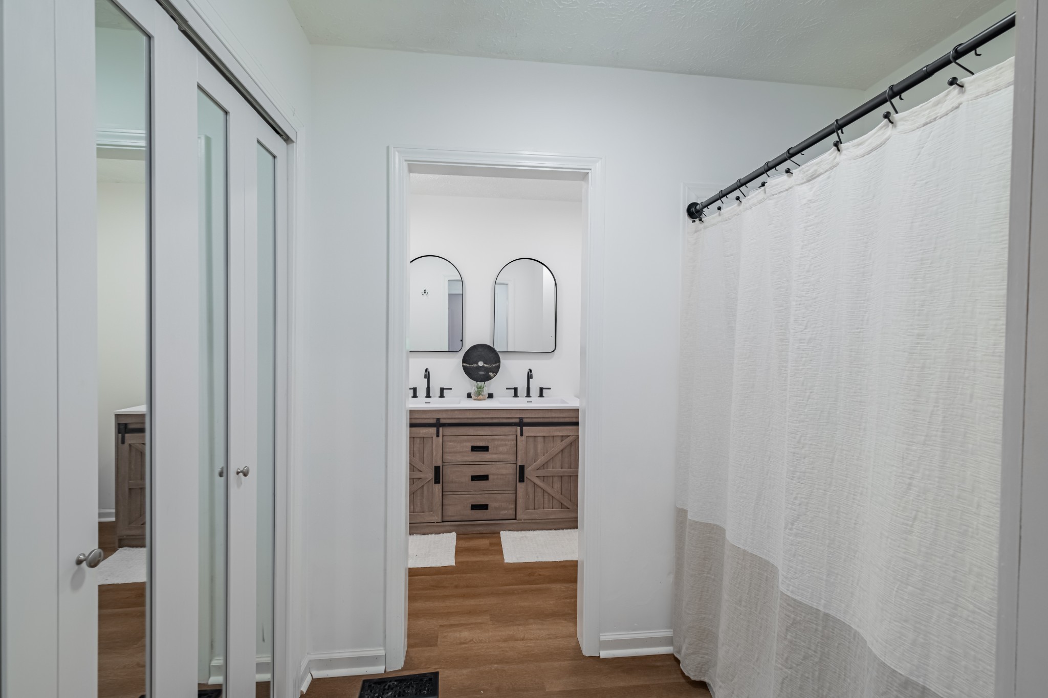 1450 Pleasant Hill Road McMinnville, TN 37110 - Photo 18 of 68 a bathroom with a sink a mirror and shower