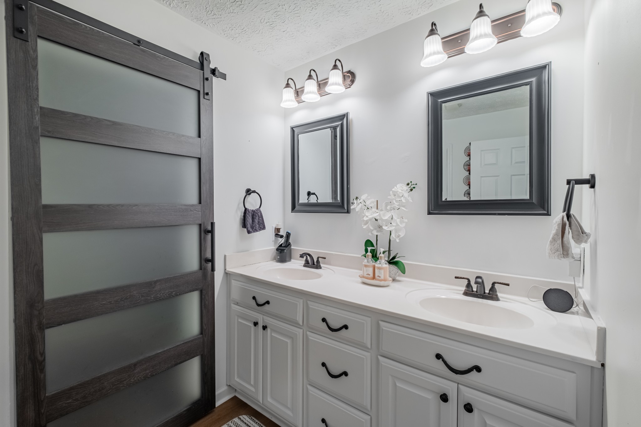 1450 Pleasant Hill Road McMinnville, TN 37110 - Photo 24 of 68 a bathroom with a double vanity sink mirror and