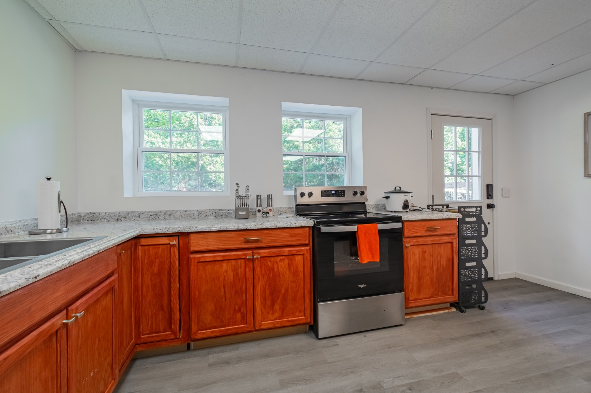1450 Pleasant Hill Road McMinnville, TN 37110 - Photo 44 of 68 a kitchen with stainless steel appliances granite countertop a sink a stove and a refrigerator