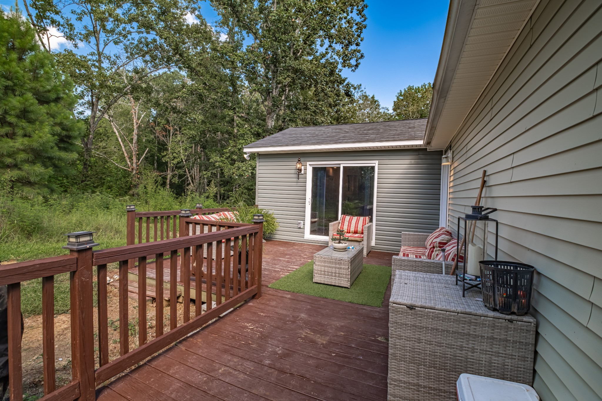 1450 Pleasant Hill Road McMinnville, TN 37110 - Photo 47 of 68 a view of a deck with wooden floor and outdoor seating
