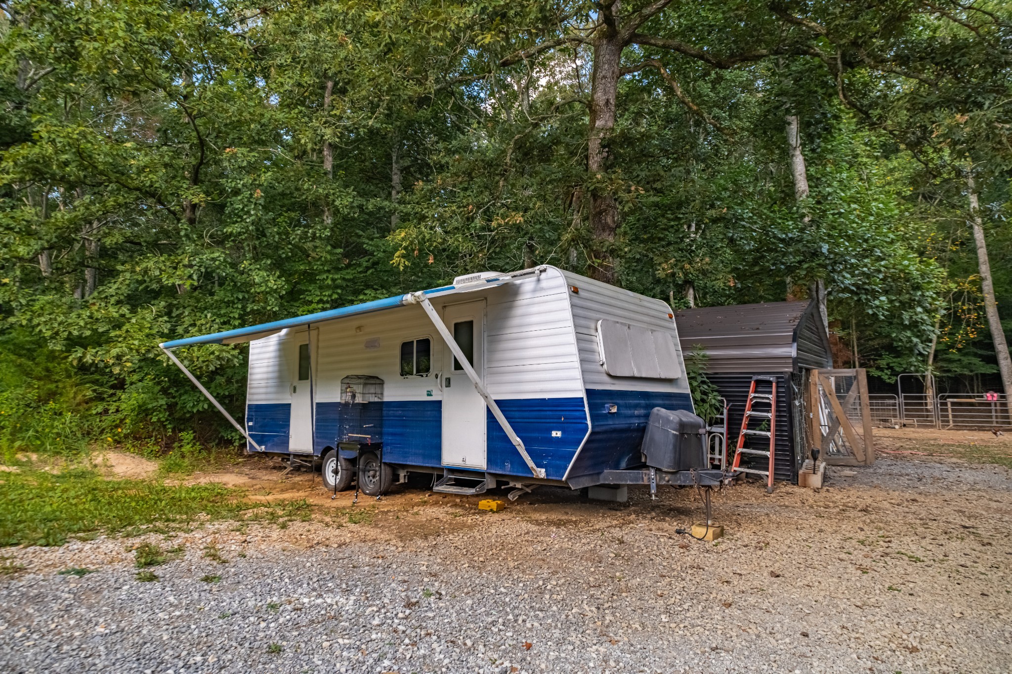 1450 Pleasant Hill Road McMinnville, TN 37110 - Photo 54 of 68 a view of a house with a yard balcony and wooden fence