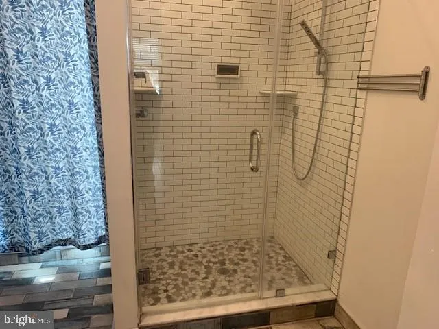 a bathroom with a toilet and a sink