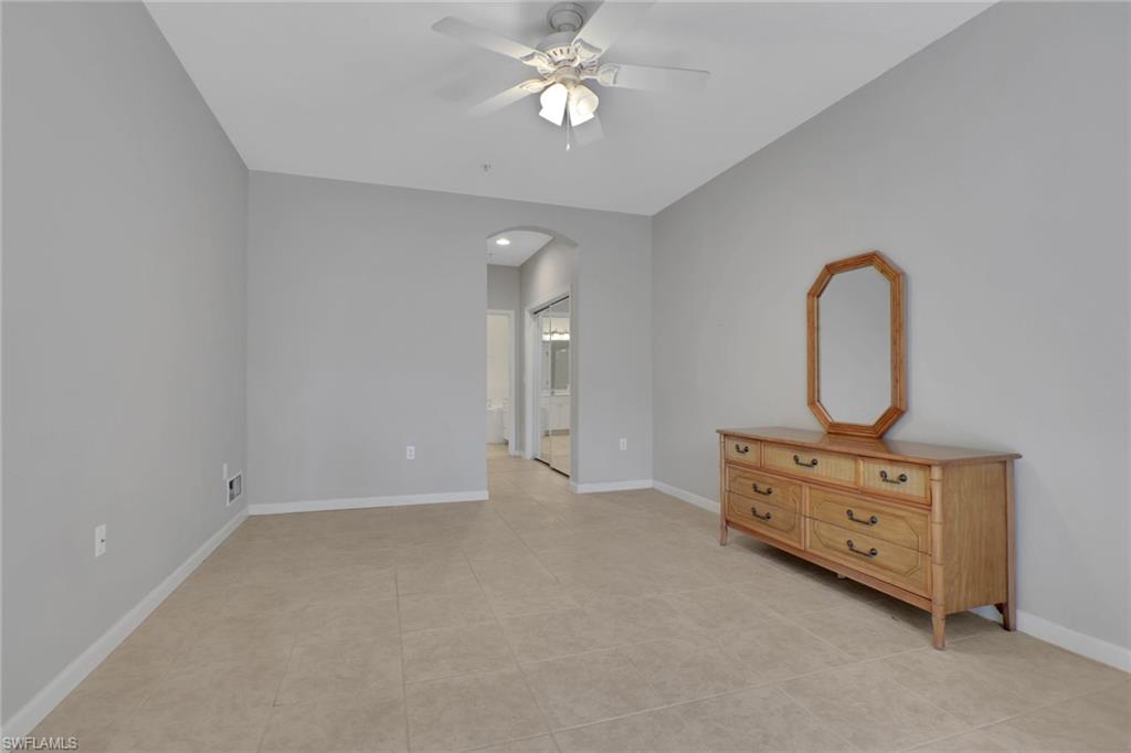 7844 Clemson Street, Unit 102 Naples, FL 34104 - Photo 14 of 31 wooden floor in a room