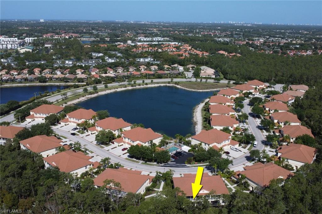 7844 Clemson Street, Unit 102 Naples, FL 34104 - Photo 31 of 31 an aerial view of residential houses with outdoor space