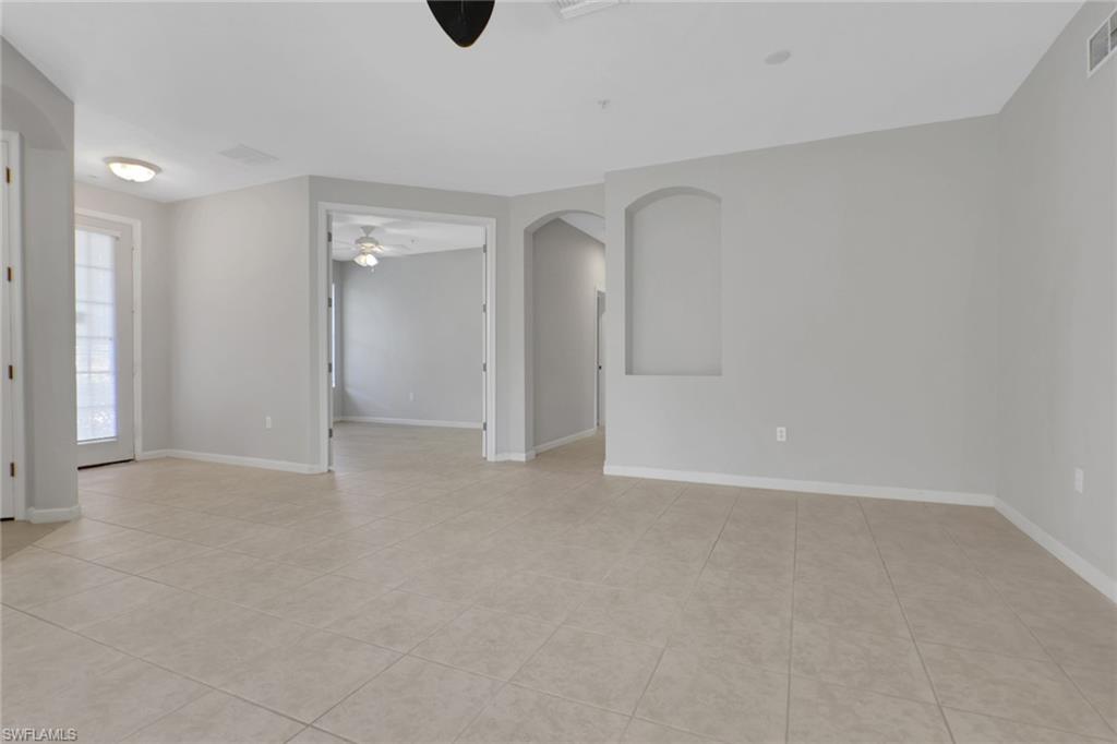 7844 Clemson Street, Unit 102 Naples, FL 34104 - Photo 5 of 31 a view of an empty room
