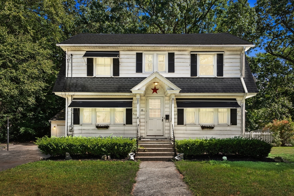 41 Nevada Street Springfield, MA 01107 - Photo 1 of 33 a front view of a house with a yard