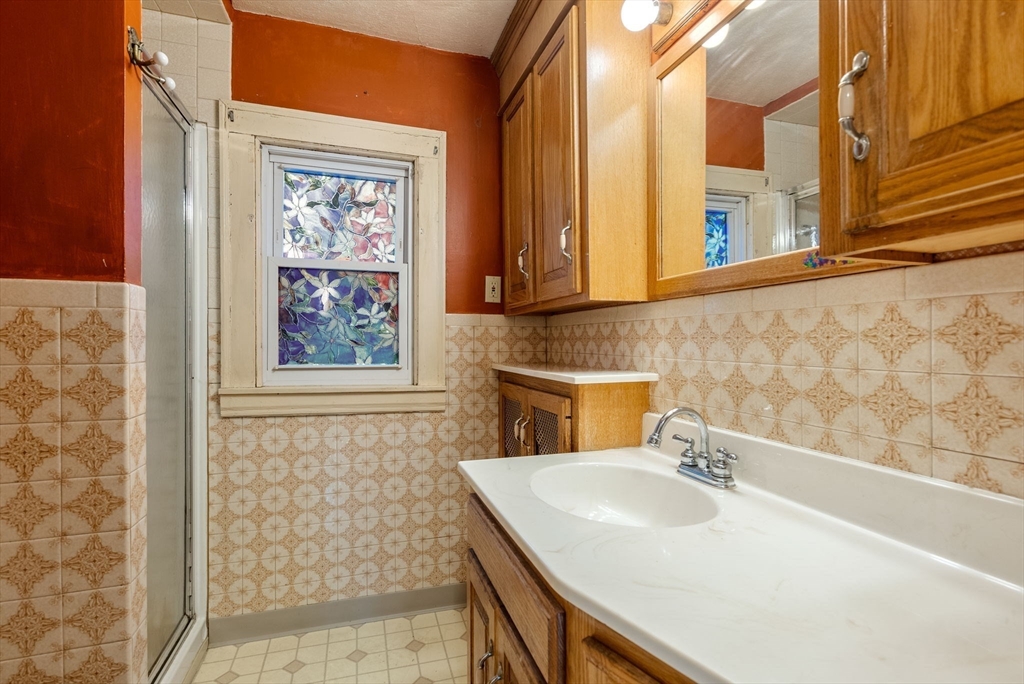 41 Nevada Street Springfield, MA 01107 - Photo 18 of 33 a bathroom with a sink and a mirror