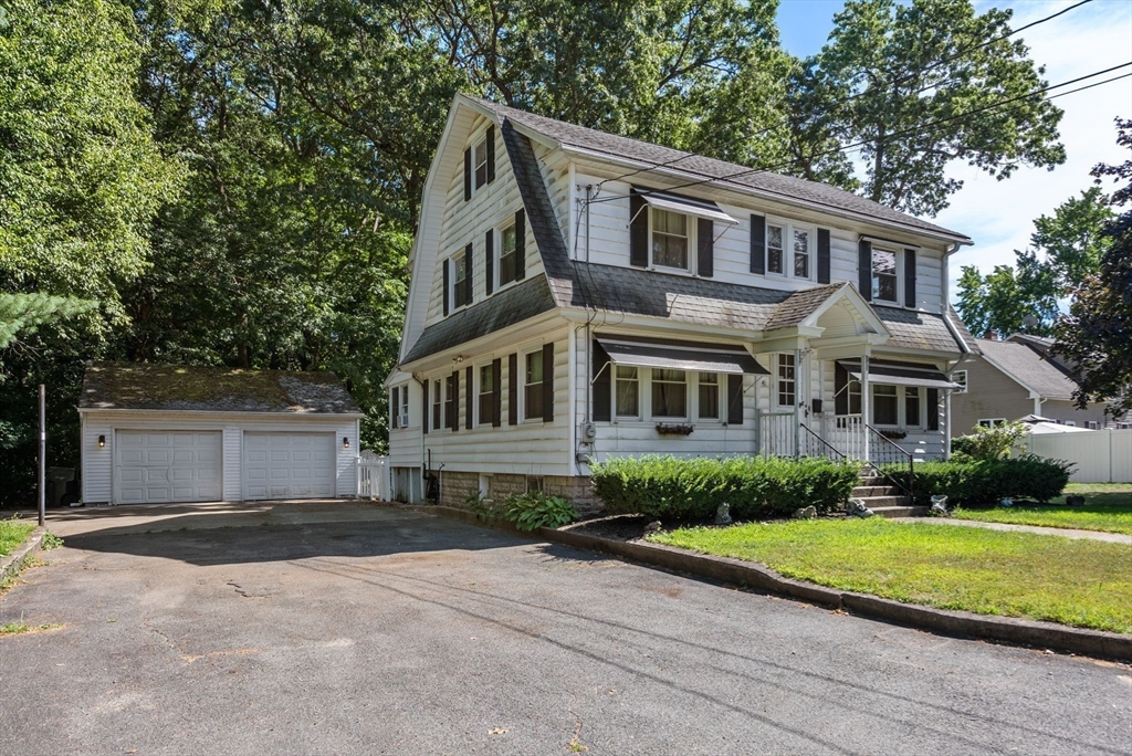 41 Nevada Street Springfield, MA 01107 - Photo 24 of 33 a front view of a house with a yard