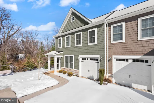 a front view of a building with street view
