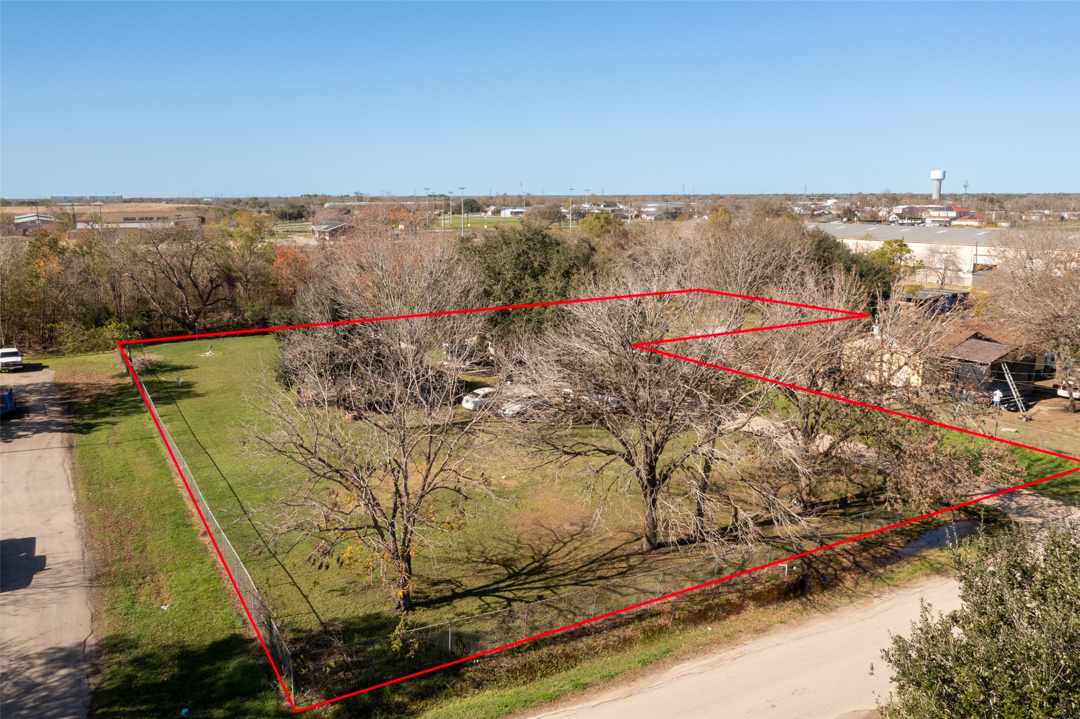 15622 2nd Street Sugar Land, TX 77498 - Photo 2 of 5 This property is more than just pieces of land; it’s a canvas for your future, dotted with multiple mature trees that add natural charm and character.