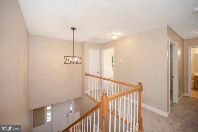 a view of a hallway with windows