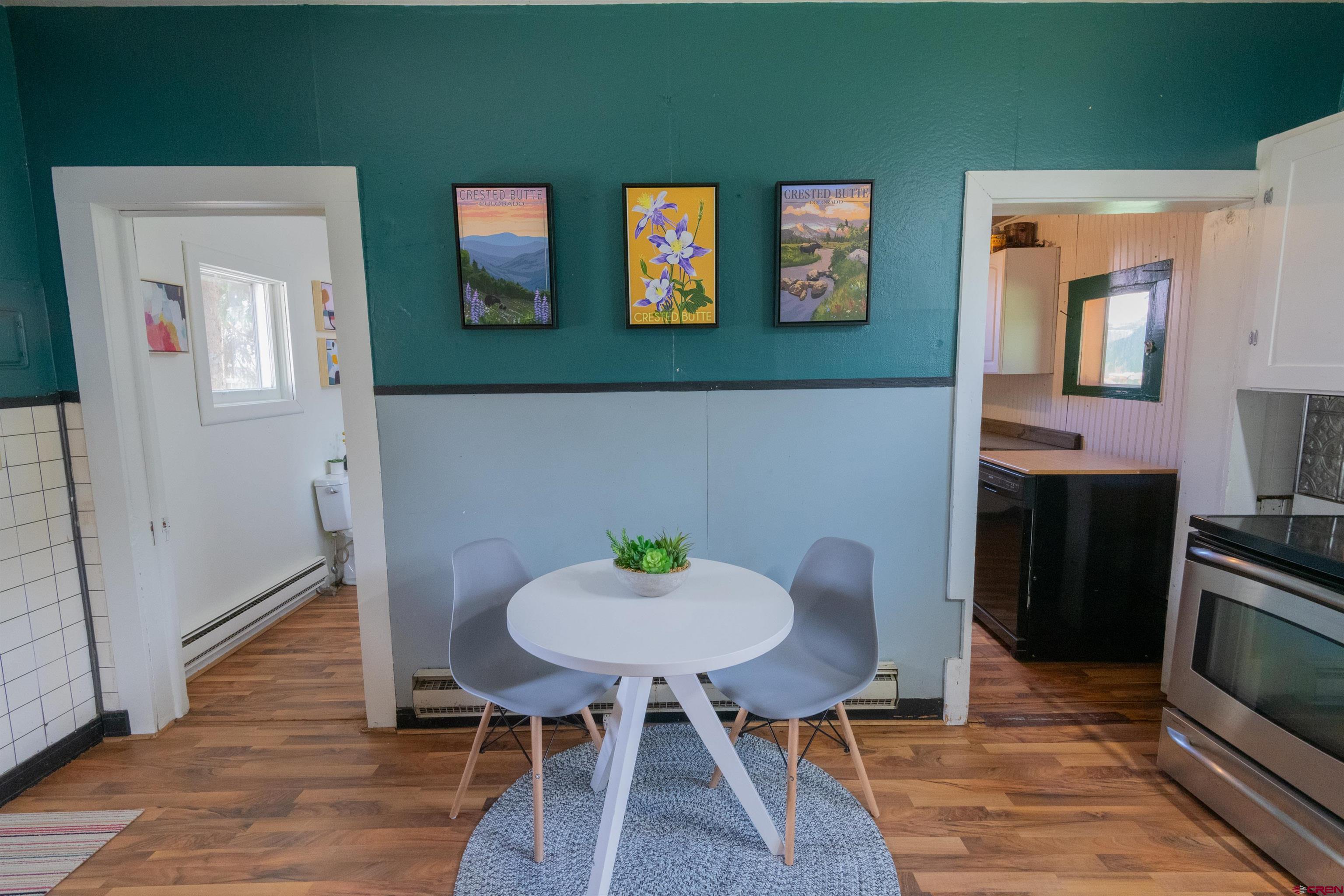 322 Maroon Avenue Crested Butte, CO 81224 - Photo 11 of 24 a living room with furniture and a wooden floor