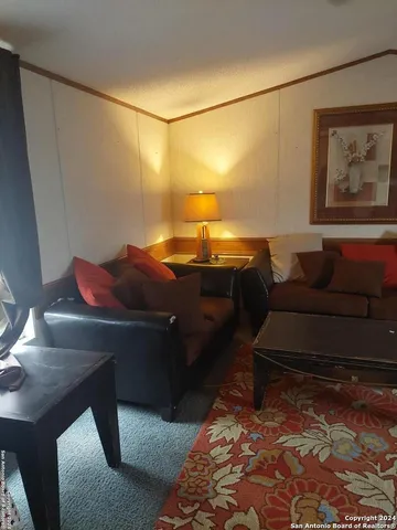 a living room with a couch and a coffee table