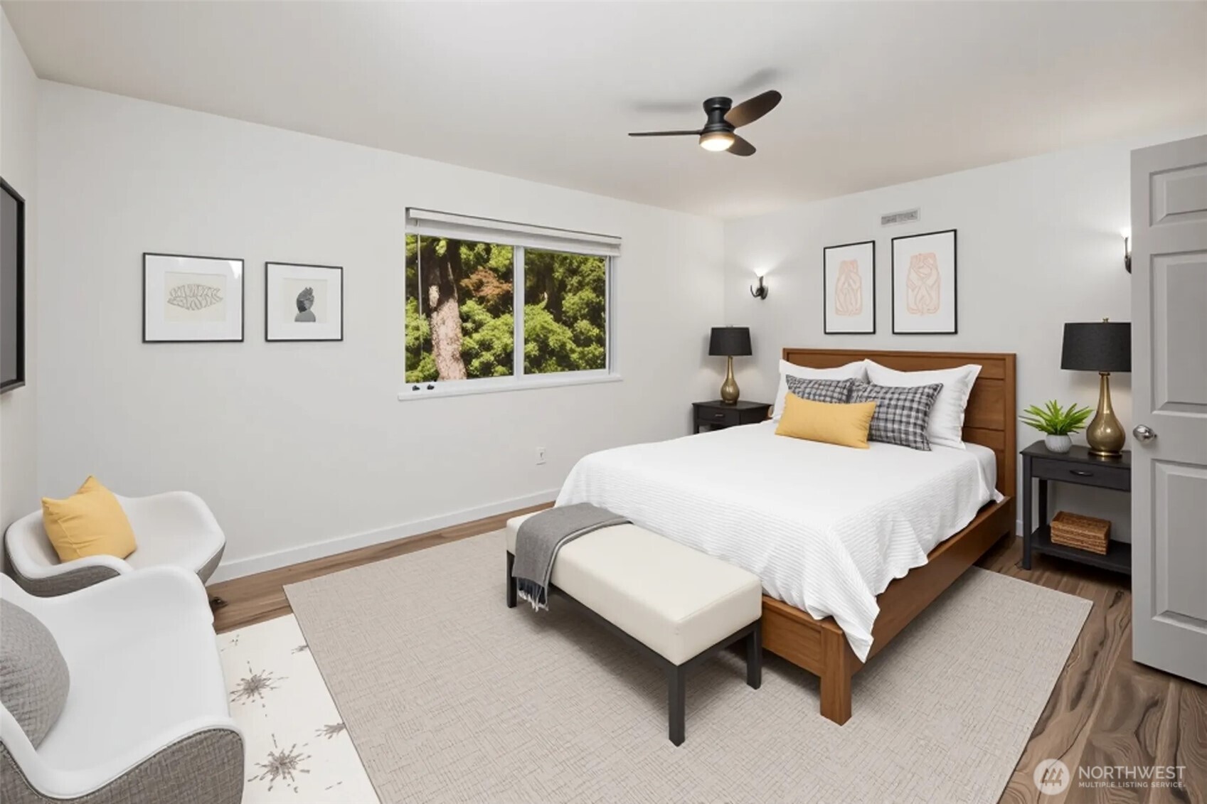 5502 Northeast 10th Street Renton, WA 98059 - Photo 11 of 27 a bedroom with a bed and window