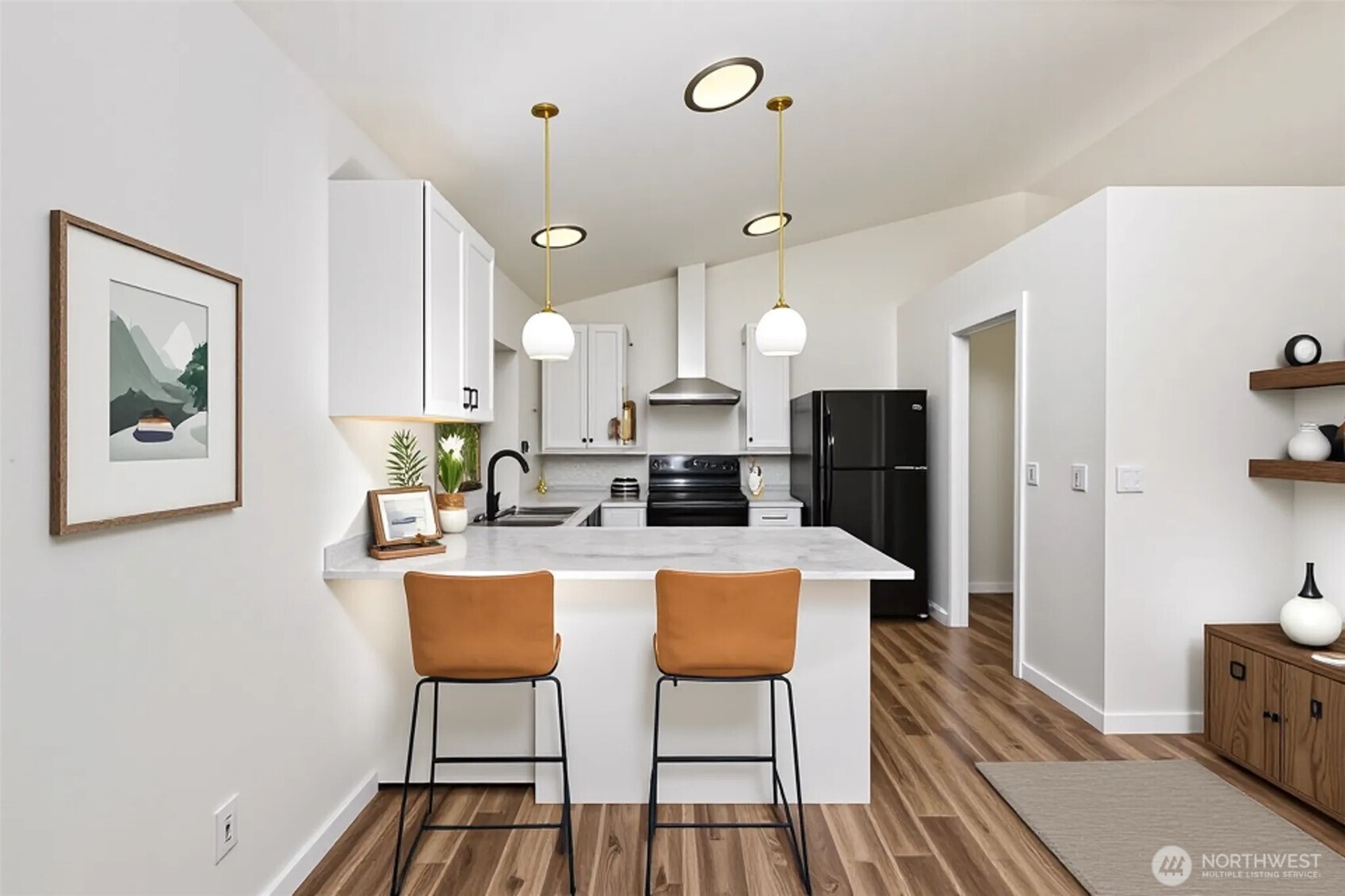 5502 Northeast 10th Street Renton, WA 98059 - Photo 7 of 27 a view of a dining room with furniture and wooden floor