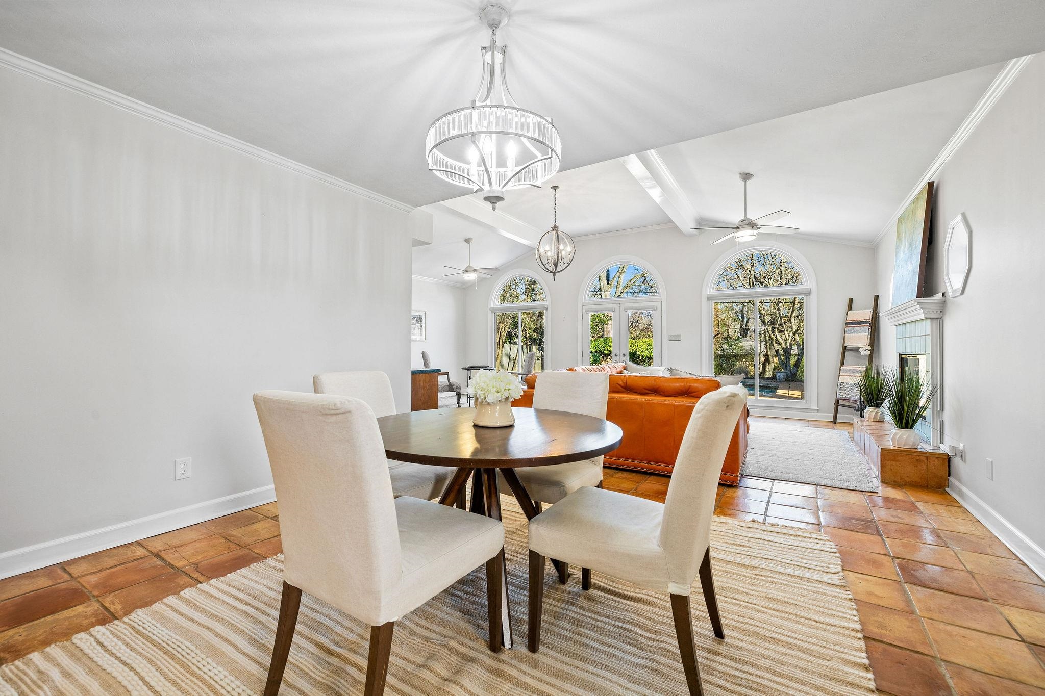 1002 Kings Park Road Memphis, TN 38117 - Photo 17 of 40 a view of a dining room with furniture window and wooden floor
