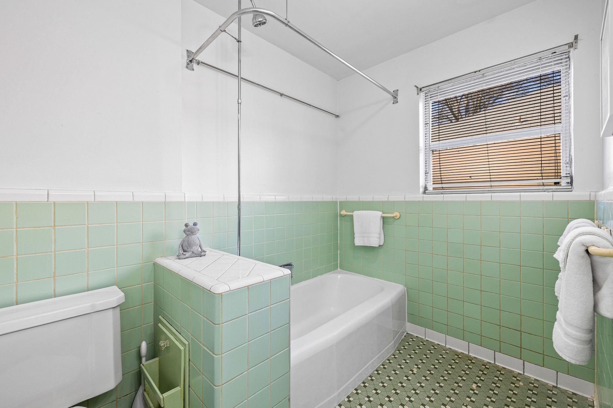 1002 Kings Park Road Memphis, TN 38117 - Photo 36 of 40 a bathroom with a sink a toilet and shower