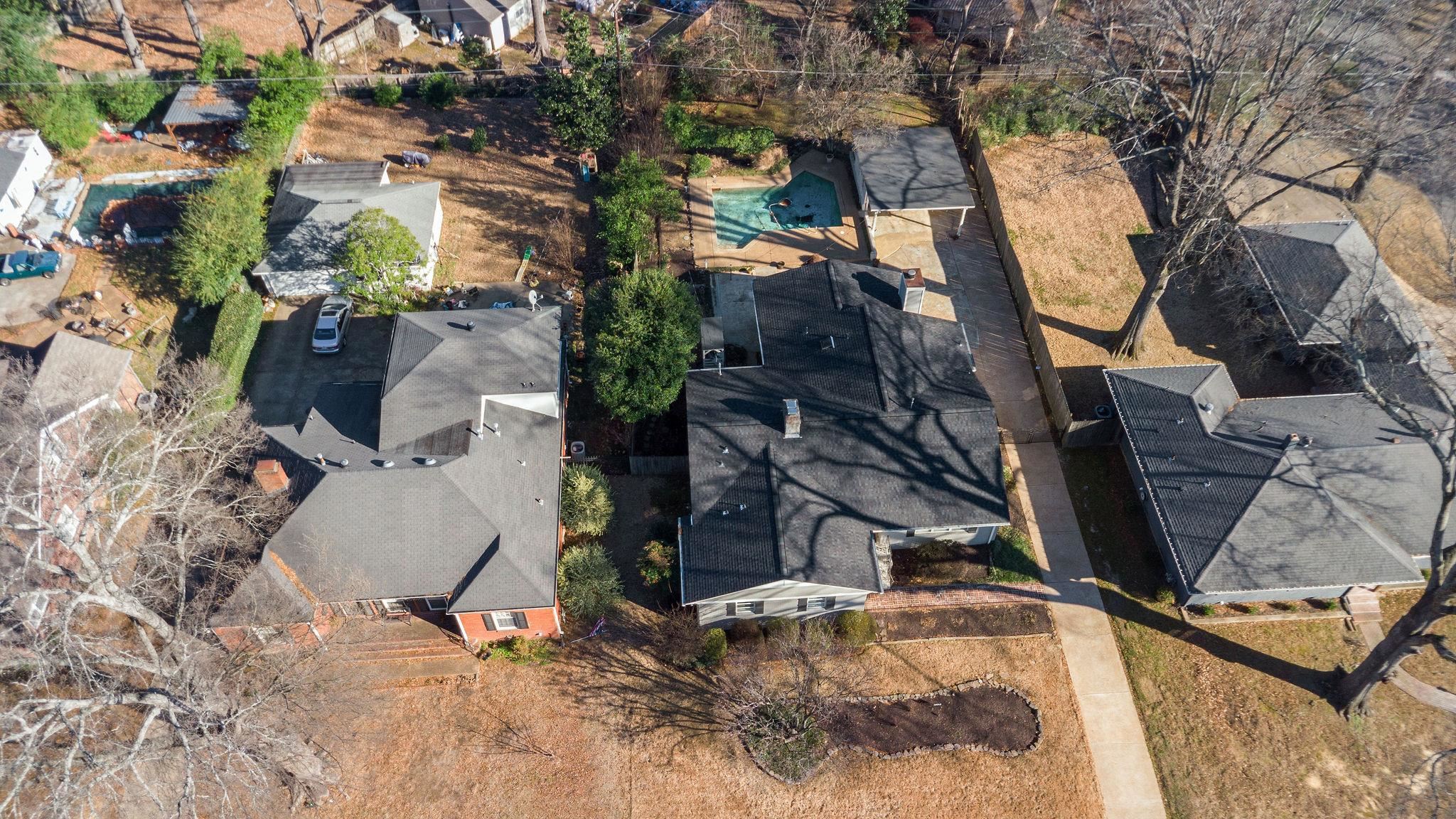 1002 Kings Park Road Memphis, TN 38117 - Photo 39 of 40 an aerial view of a house with swimming pool and large trees