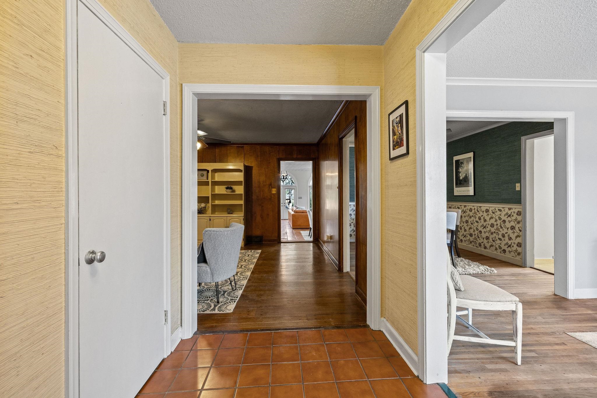 1002 Kings Park Road Memphis, TN 38117 - Photo 6 of 40 a view of a hallway with wooden floor and glass door
