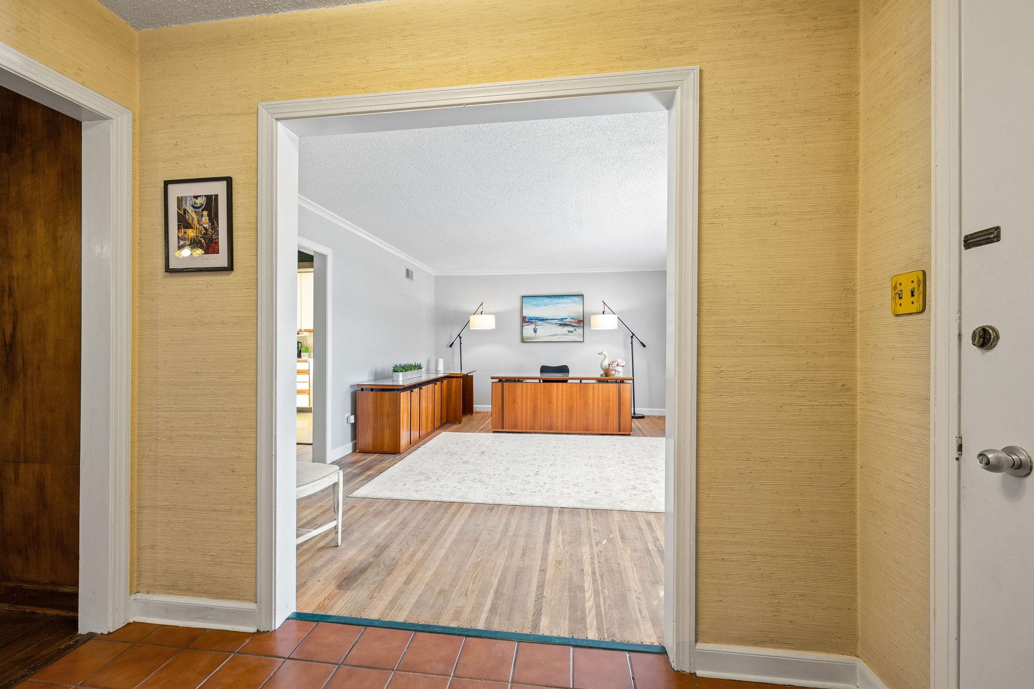 1002 Kings Park Road Memphis, TN 38117 - Photo 7 of 40 a view of a living room with a wooden floor