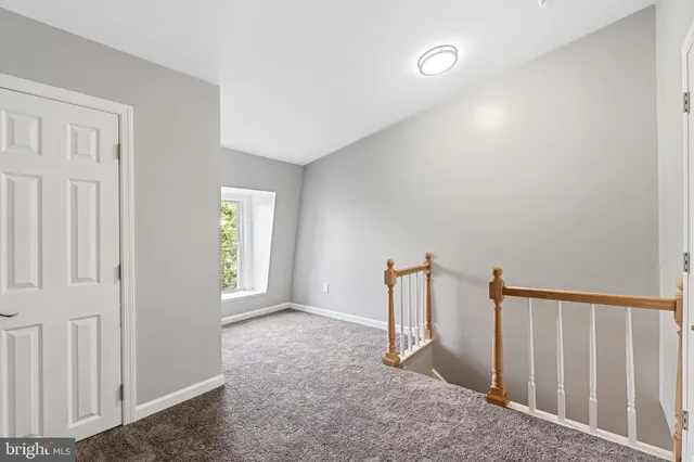 a view of a livingroom with a ceiling fan