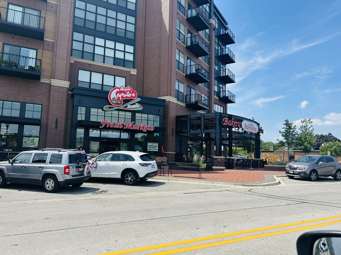 415 East Lincoln Street Mount Prospect, IL 60056 - Photo 9 of 10 a cars parked in front of a building