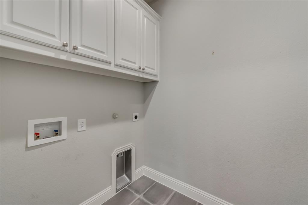 3916 Ironbark Way McKinney, TX 75071 - Photo 16 of 23 a view of cabinets