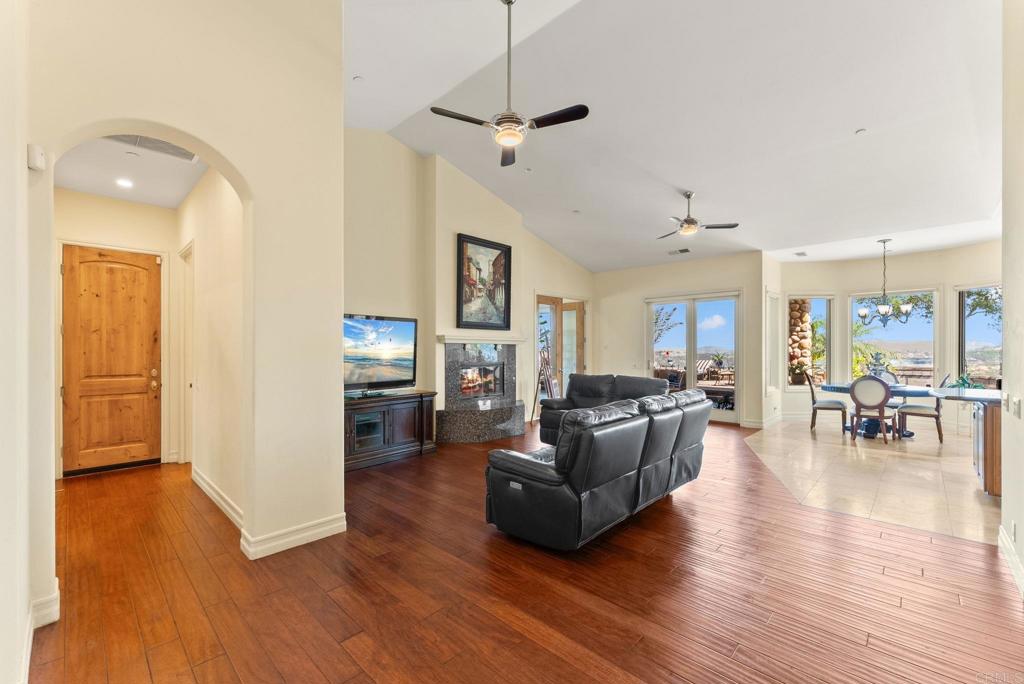 28820 Willow Park Road Escondido, CA 92026 - Photo 19 of 72 a living room with furniture and a wooden floor